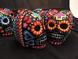 Calaveras mexicanas de Día de Muertos pintada a mano. Color negro